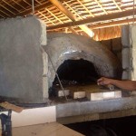 Wood fired oven opening given a finishing touch by our expert workers.
