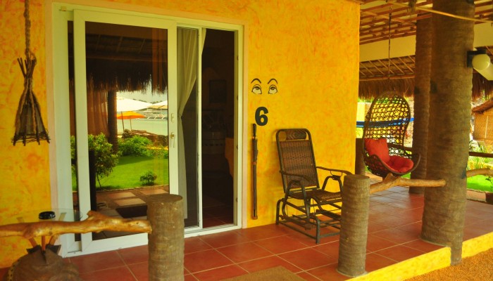 Premium Room with hammock and tall chair as you explore Malapascua's Paradise.